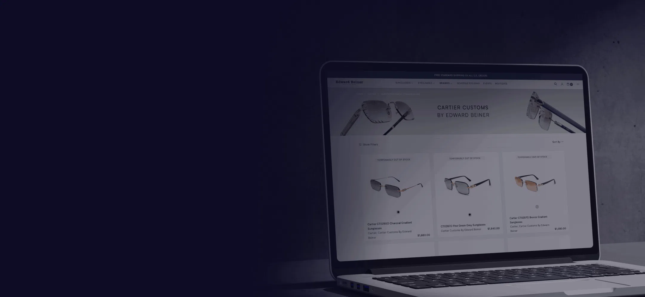 A laptop displaying a webpage featuring various eyewear designs. The dark background highlights the screen, creating a sleek and modern feel.